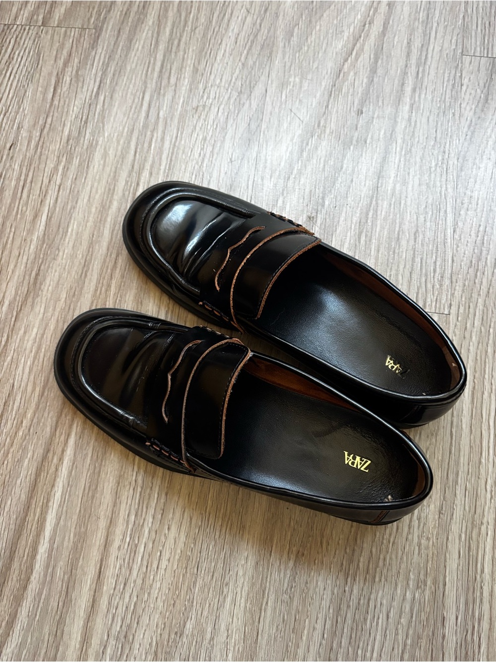 Zara Black Leather Slip-On Penny Loafers with Brown Trim